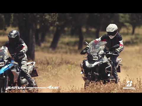 Load and play video in Gallery viewer, Bridgestone AX41 400-18 Rear Tubeless Adventure Tyre (64P)
